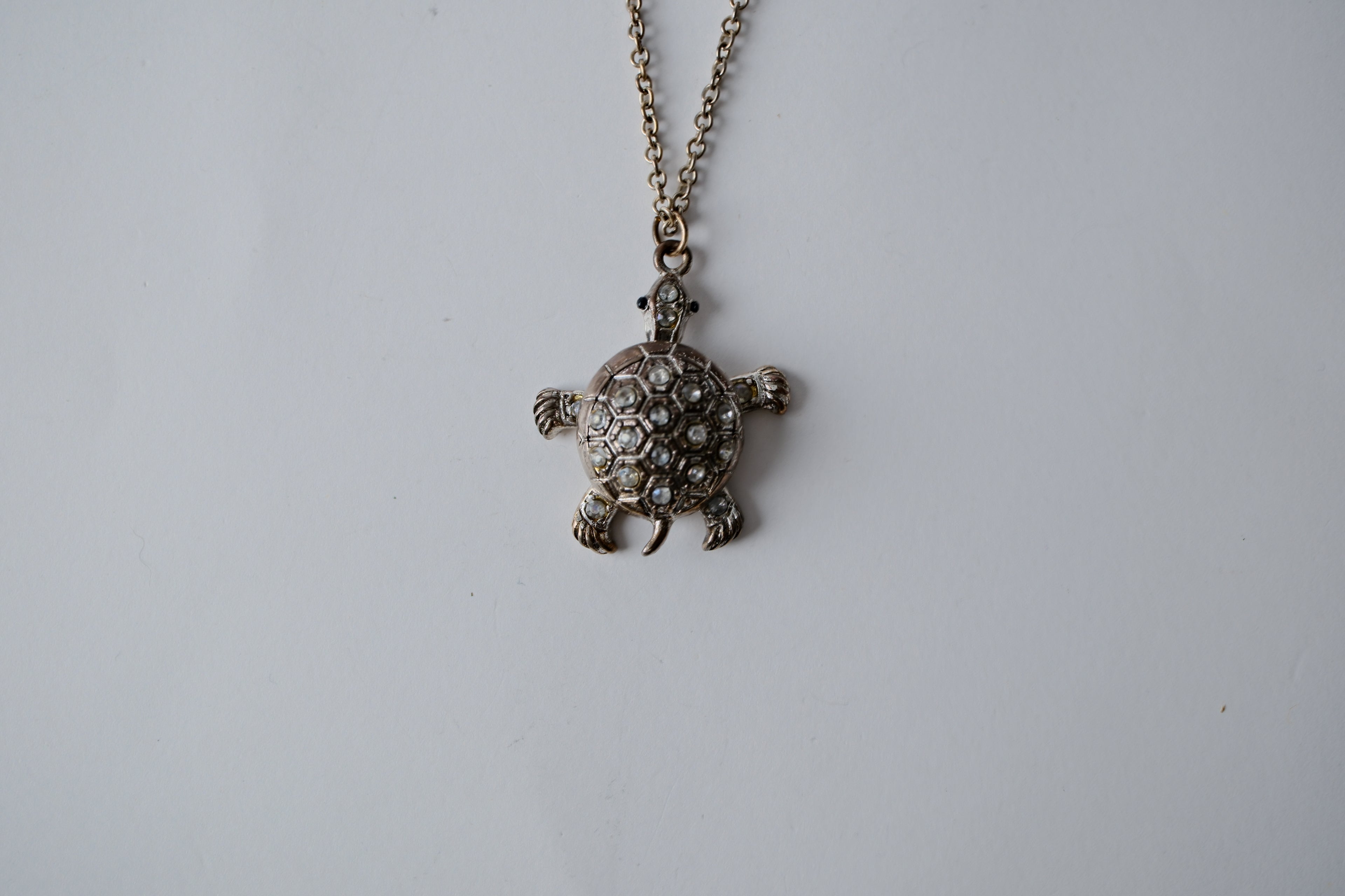 Silver swimming sea turtle necklace
