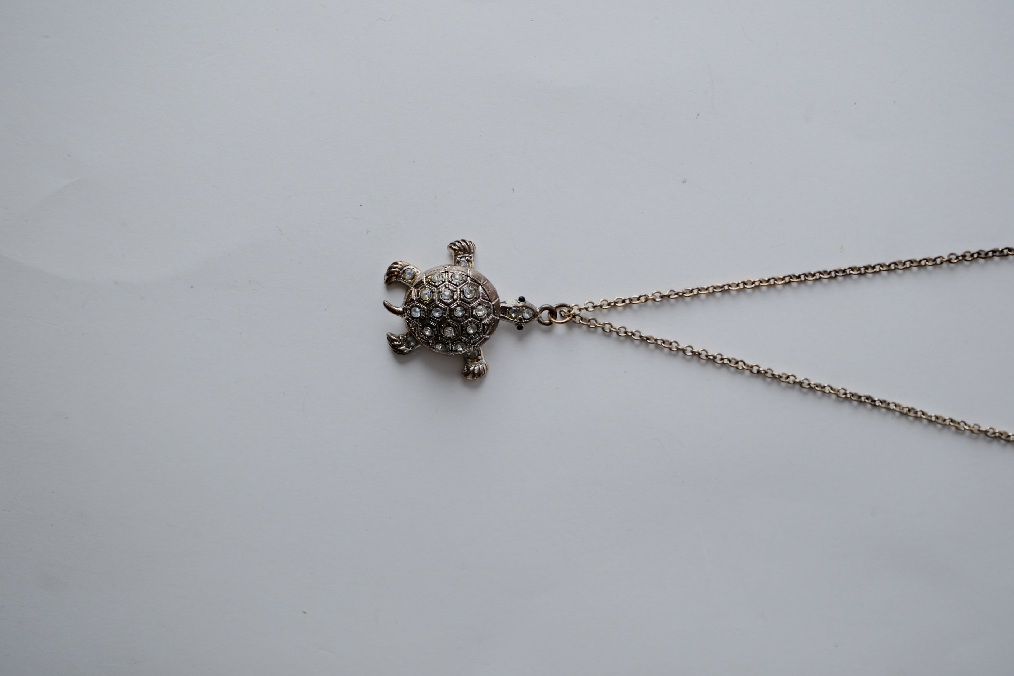 Silver swimming sea turtle necklace