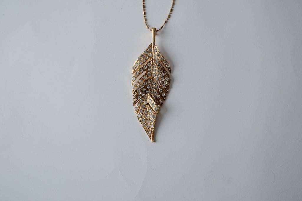 Gold Tone Feather Pendant Pave Articulated Necklace