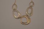 Vintage gold toned geometric bib necklace