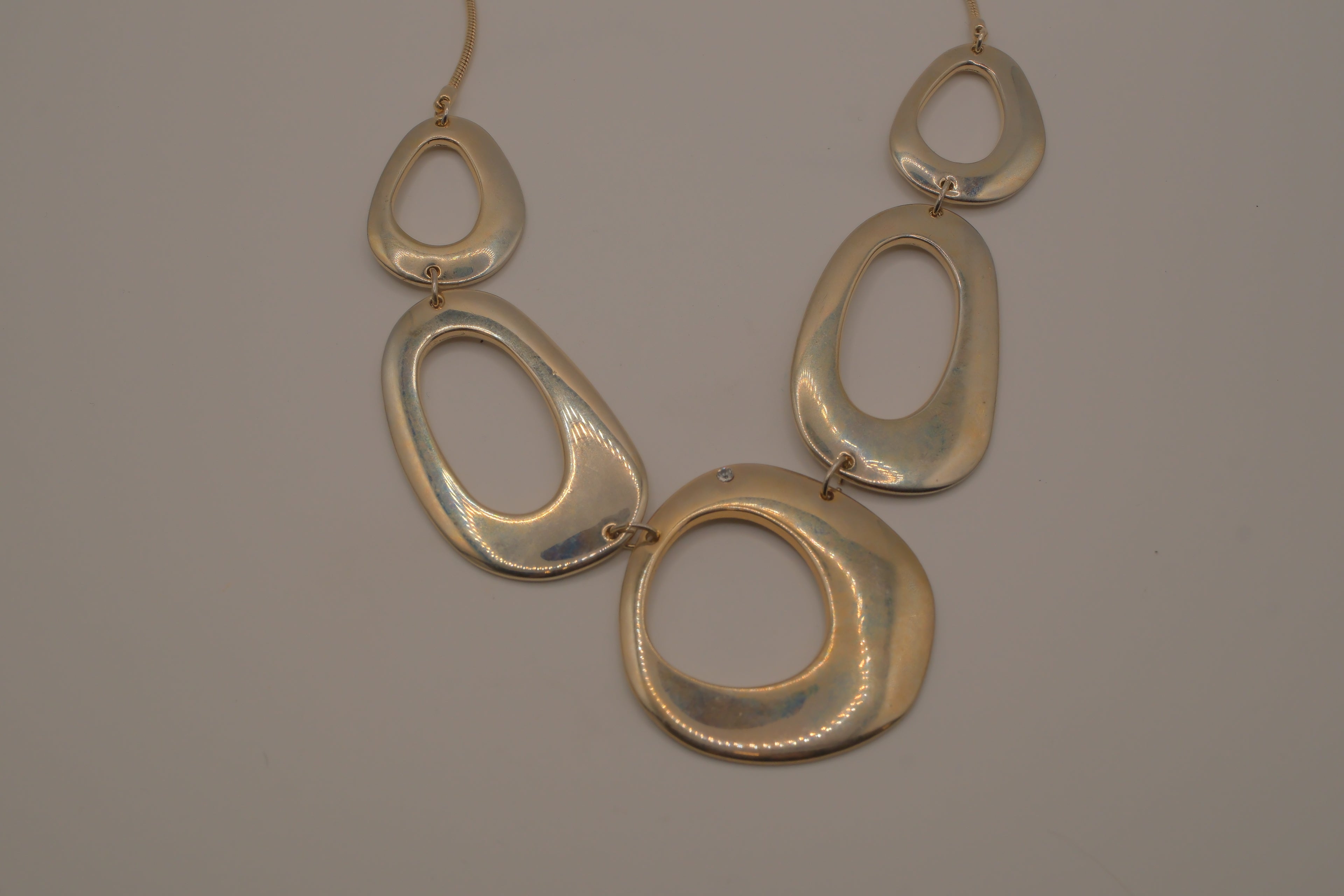 Vintage gold toned geometric bib necklace