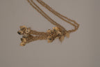 Vintage gold-tone multi-strand leaf and flower tassel necklace