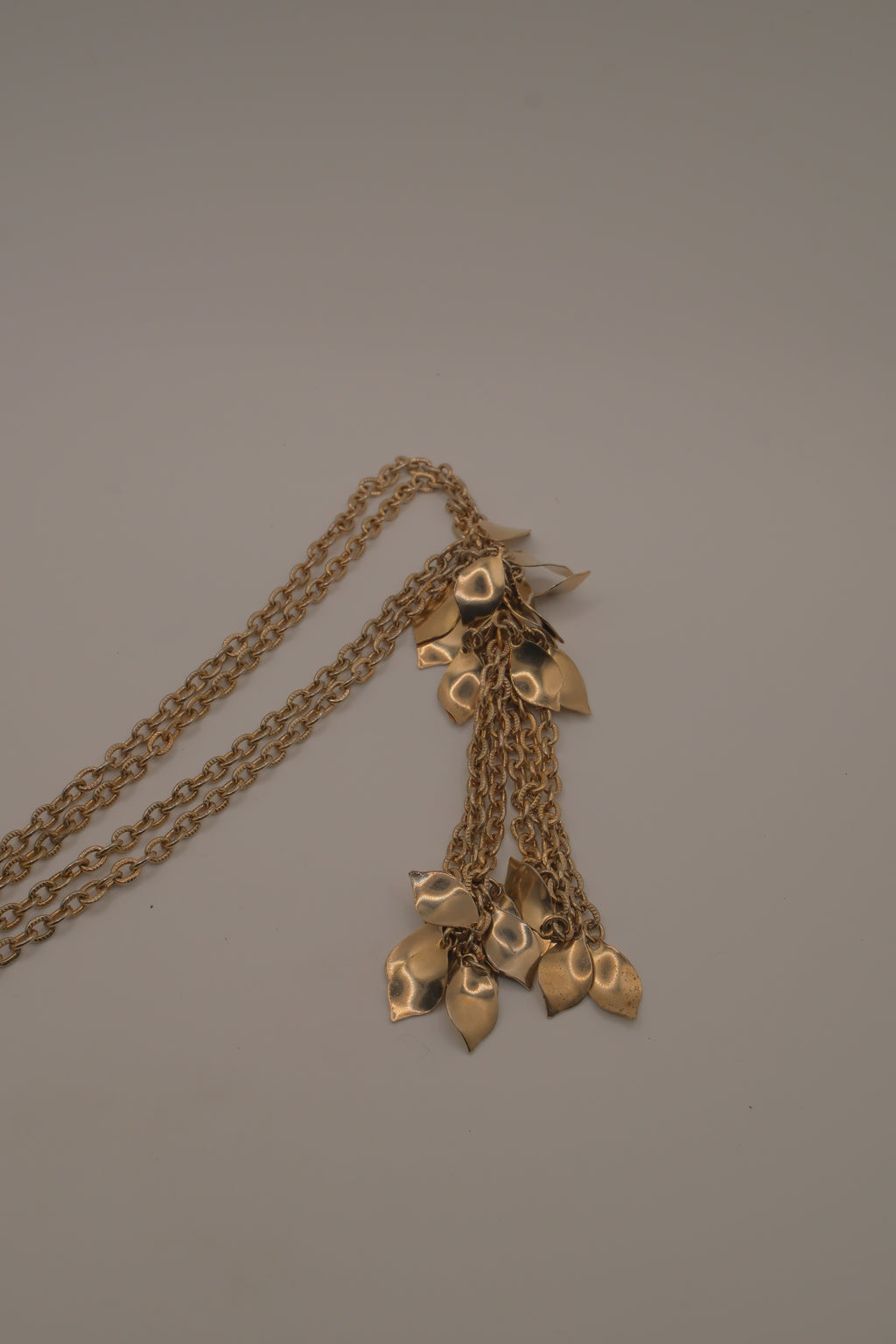 Vintage gold-tone multi-strand leaf and flower tassel necklace
