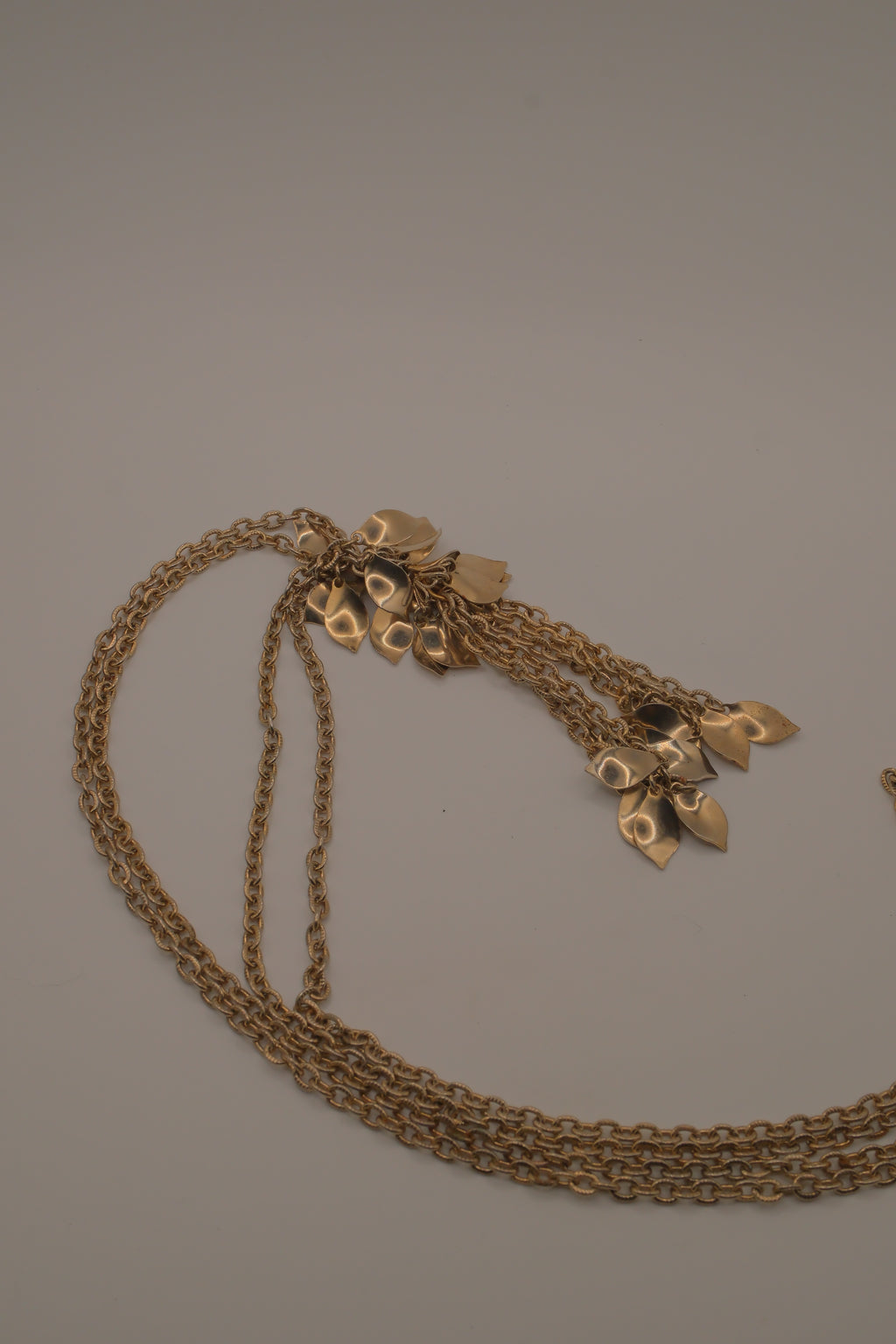 Vintage gold-tone multi-strand leaf and flower tassel necklace
