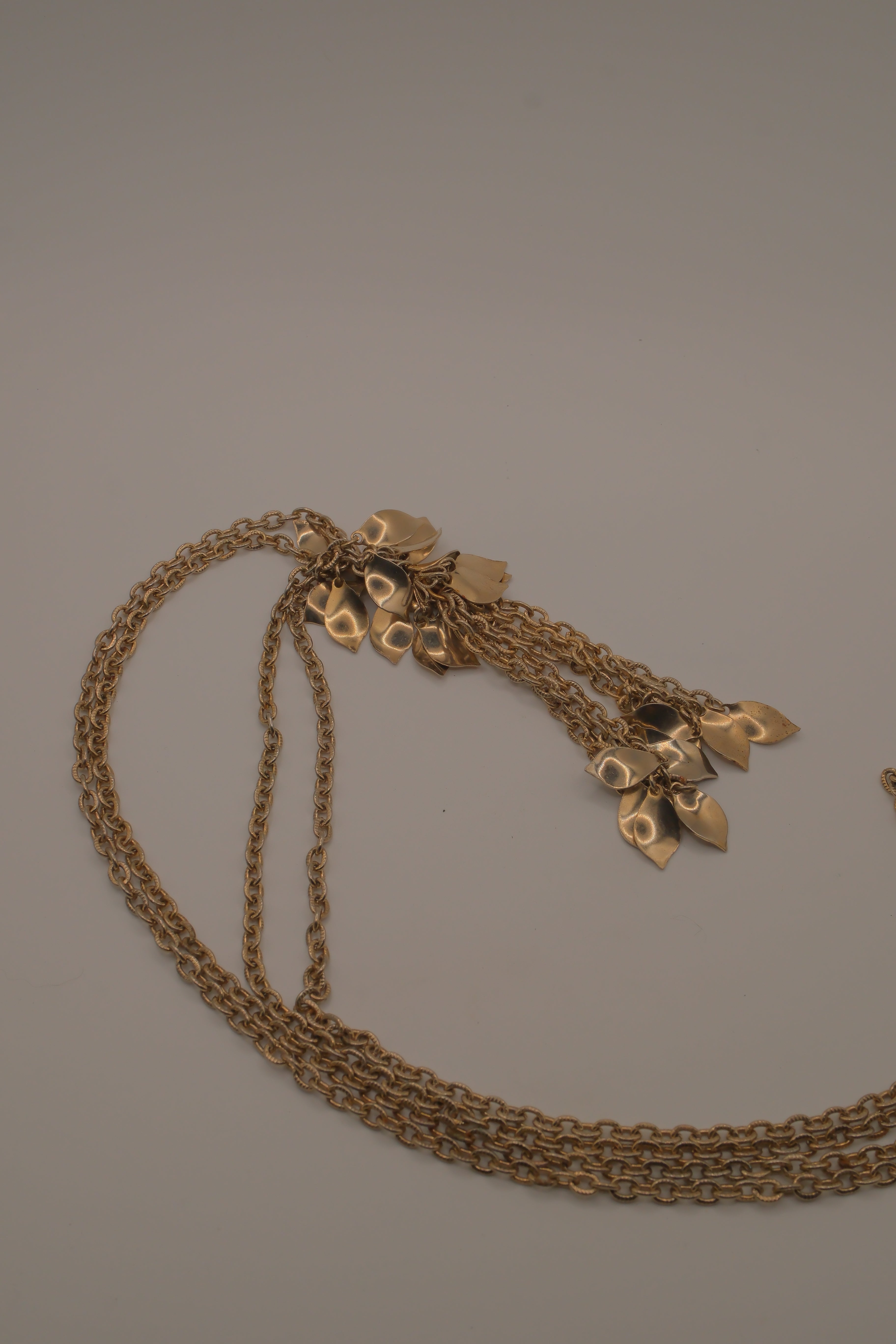 Vintage gold-tone multi-strand leaf and flower tassel necklace