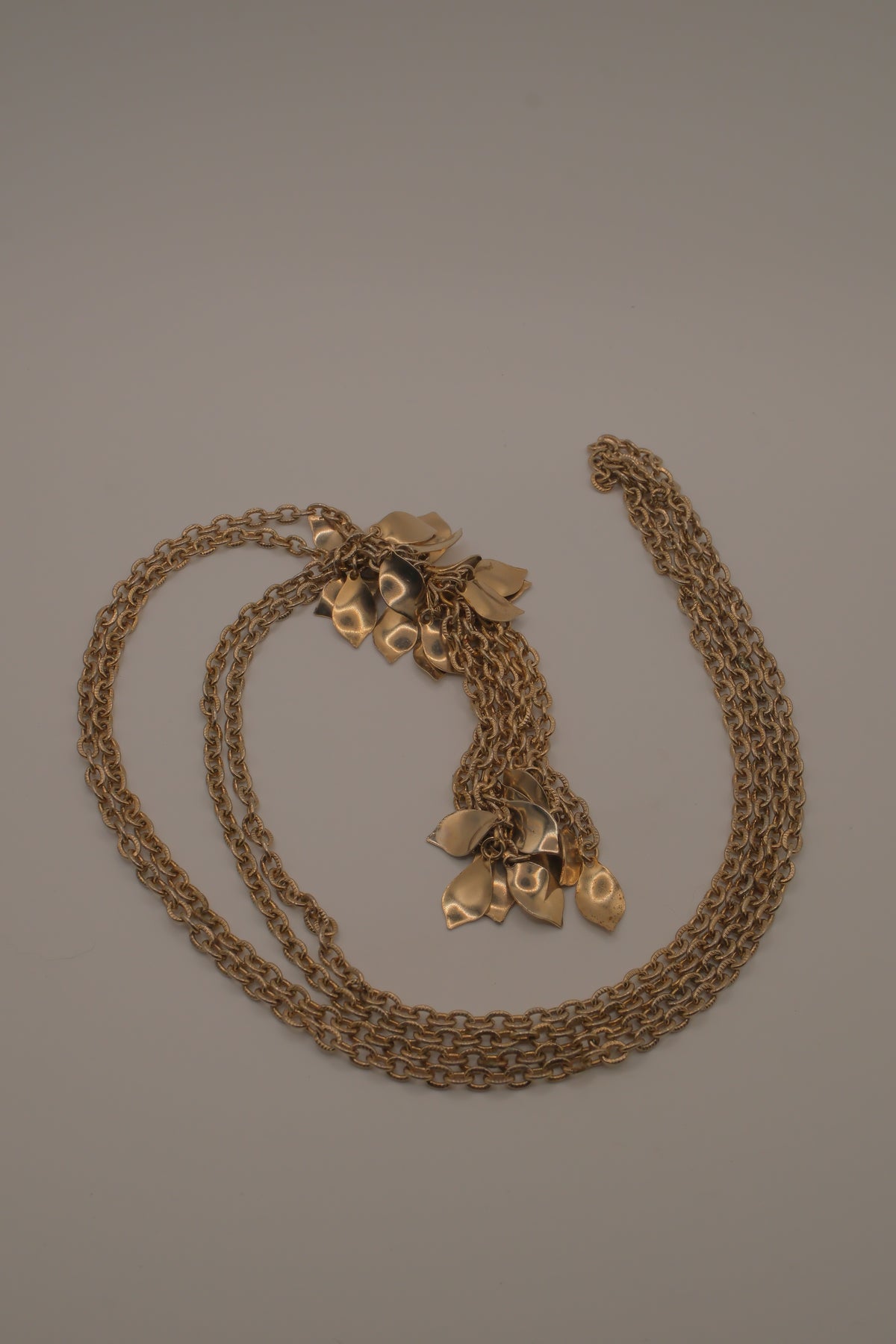 Vintage gold-tone multi-strand leaf and flower tassel necklace