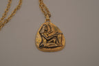 Vintage Egyptian-style gold pendant