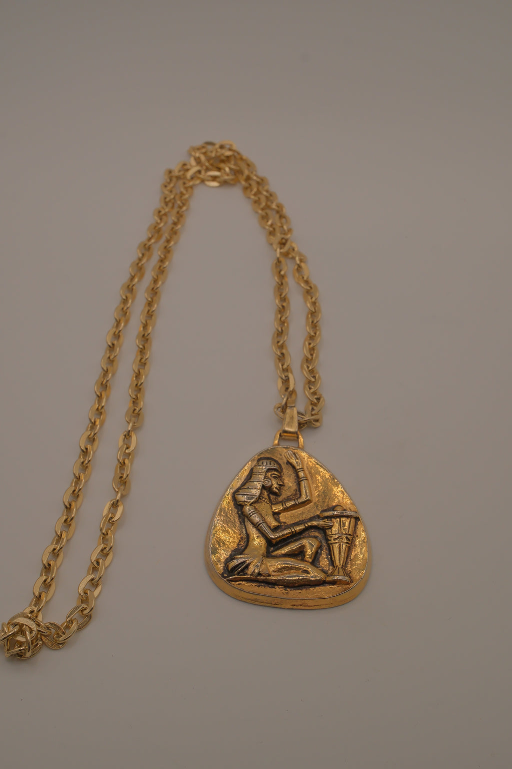 Vintage Egyptian-style gold pendant