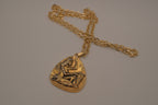 Vintage Egyptian-style gold pendant