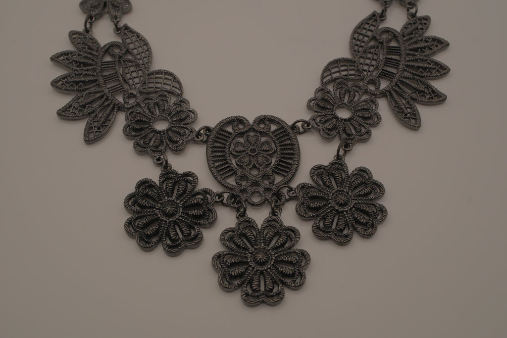 Black filigree bib statement necklace