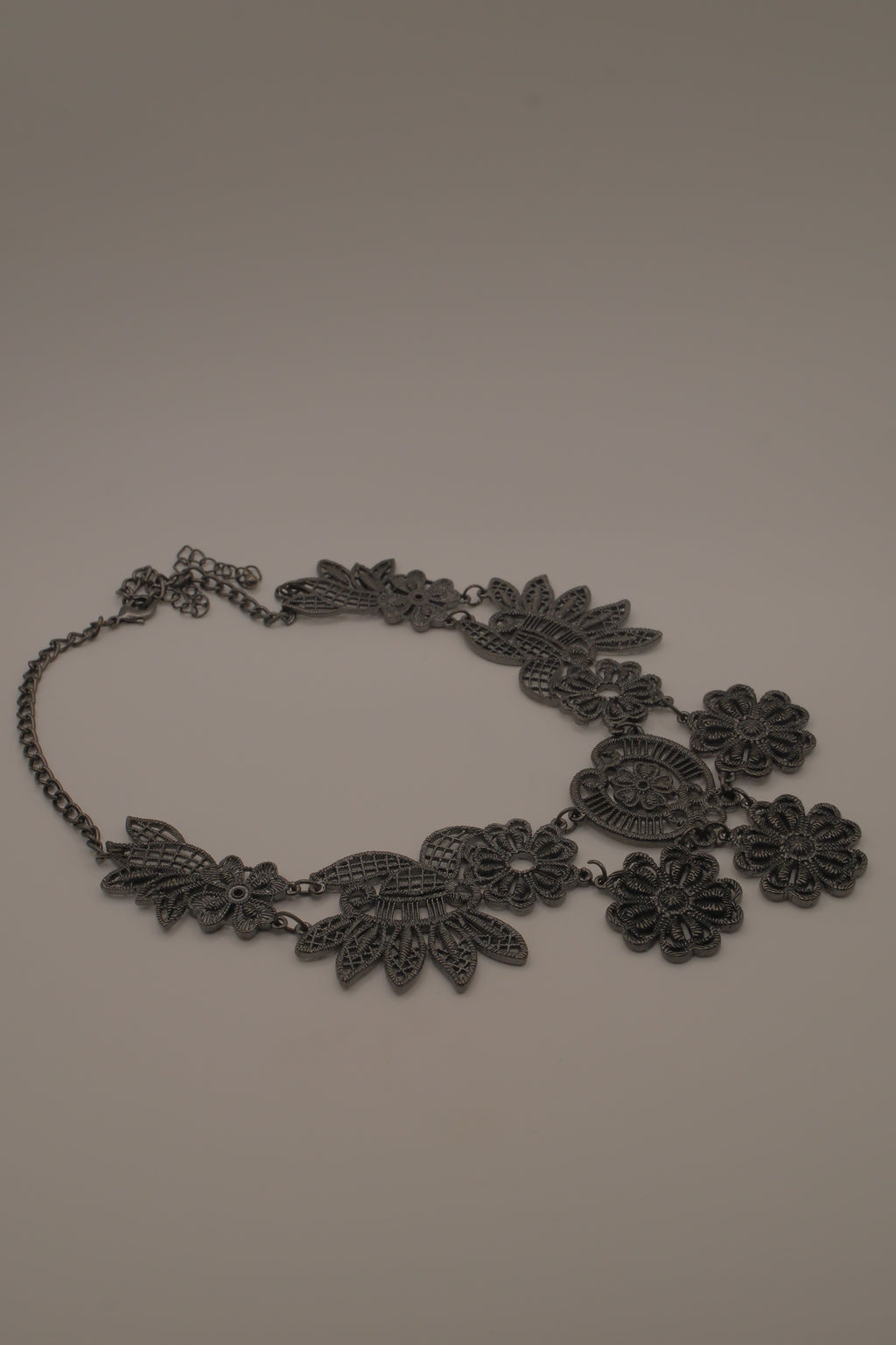 Black filigree bib statement necklace