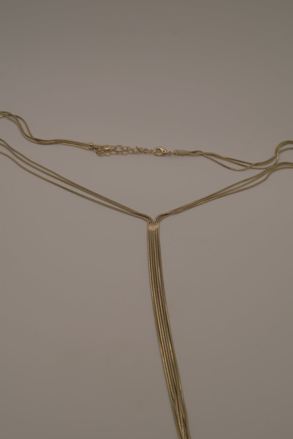 Multi-strand gold lariat necklace