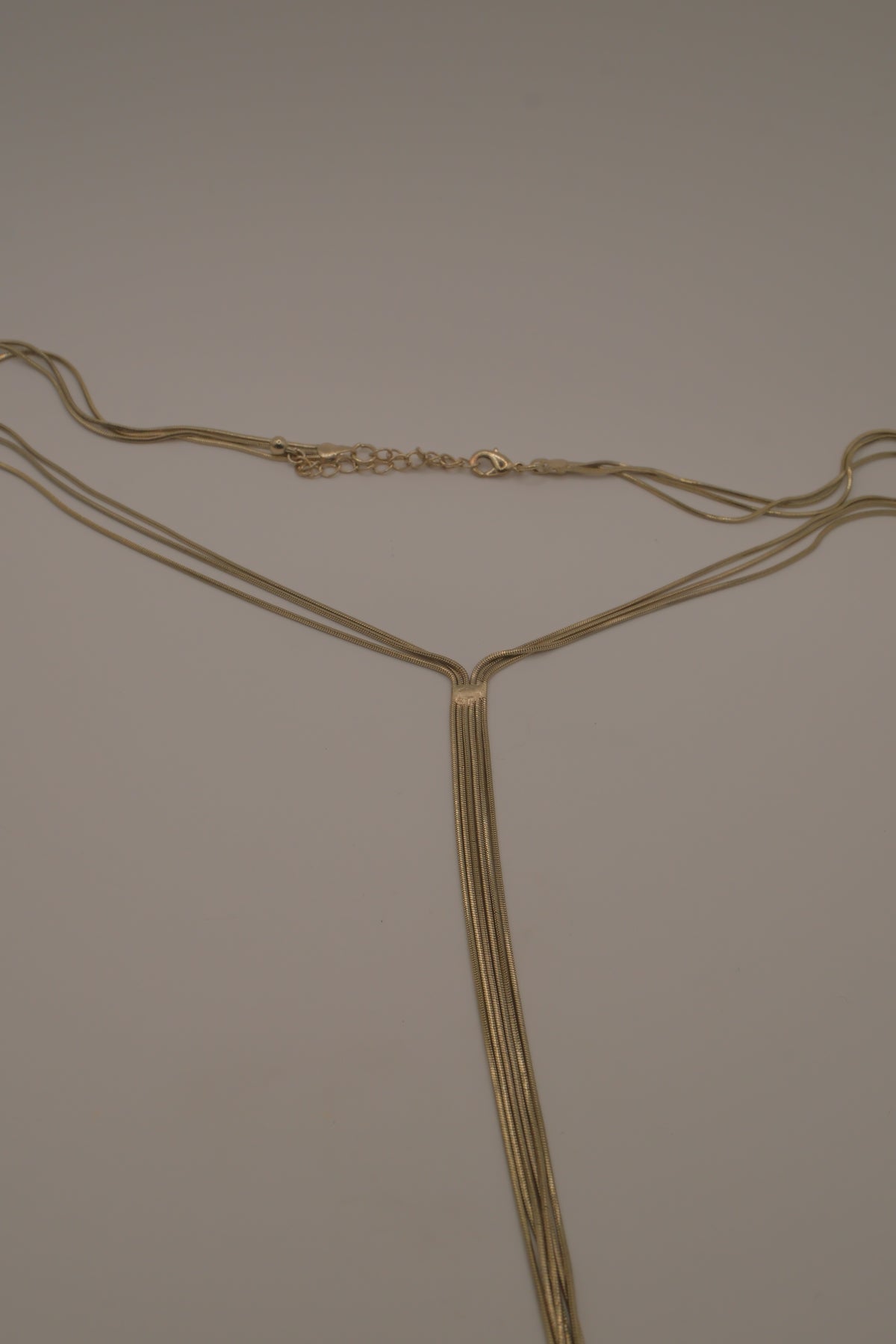 Multi-strand gold lariat necklace