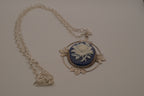 Victorian-style blue and white rose cameo pendant necklace
