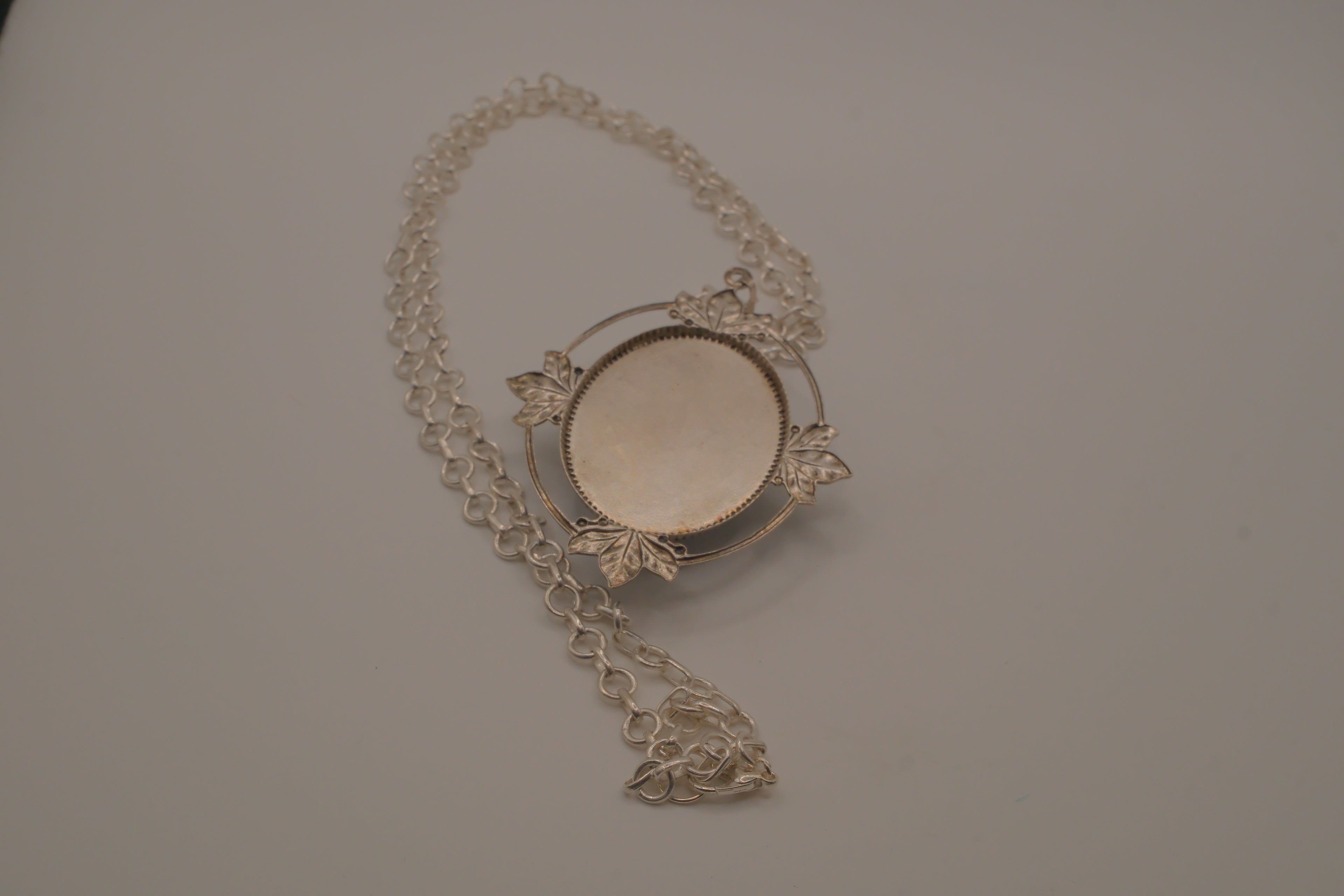 Victorian-style blue and white rose cameo pendant necklace