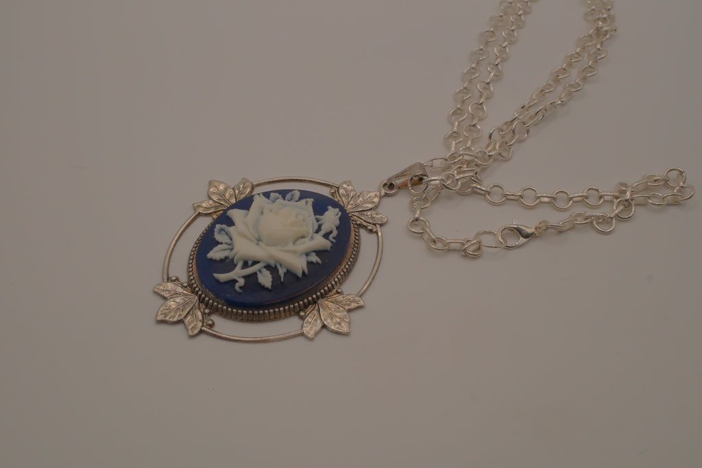 Victorian-style blue and white rose cameo pendant necklace