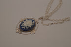Victorian-style blue and white rose cameo pendant necklace