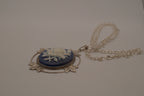 Victorian-style blue and white rose cameo pendant necklace