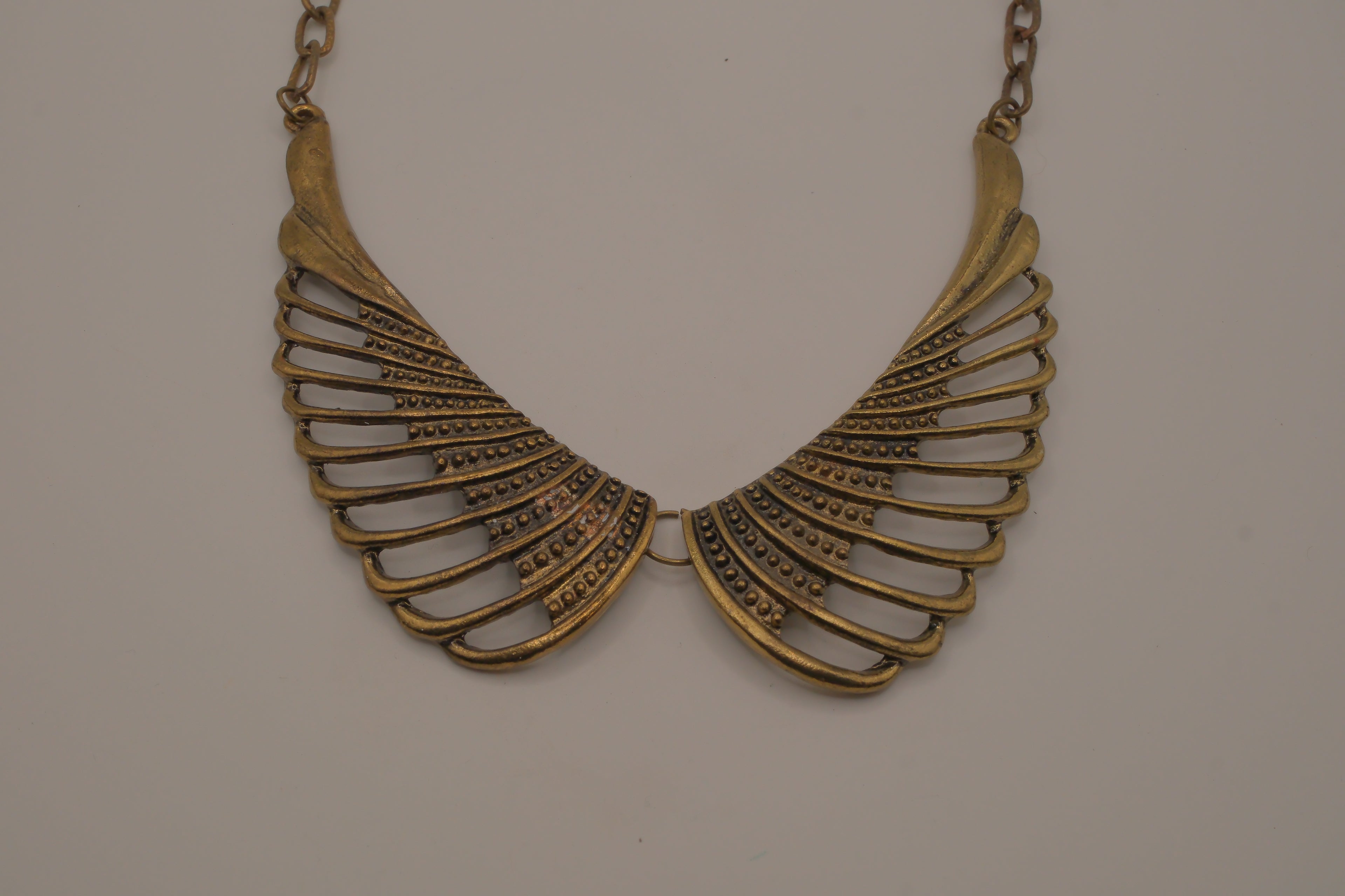 Vintage brass wing-shaped collar bib necklace