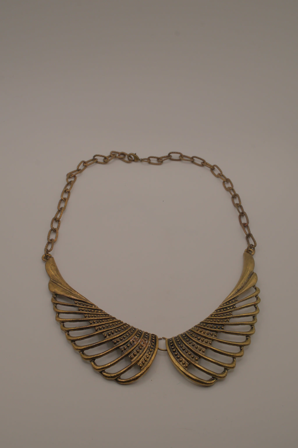Vintage brass wing-shaped collar bib necklace