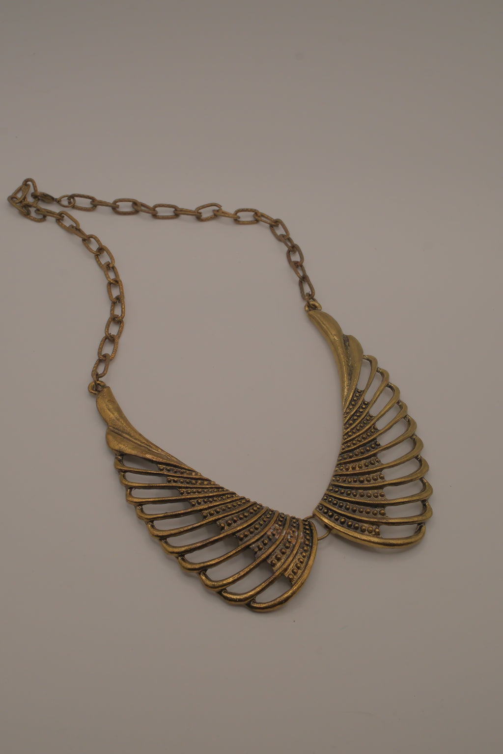 Vintage brass wing-shaped collar bib necklace