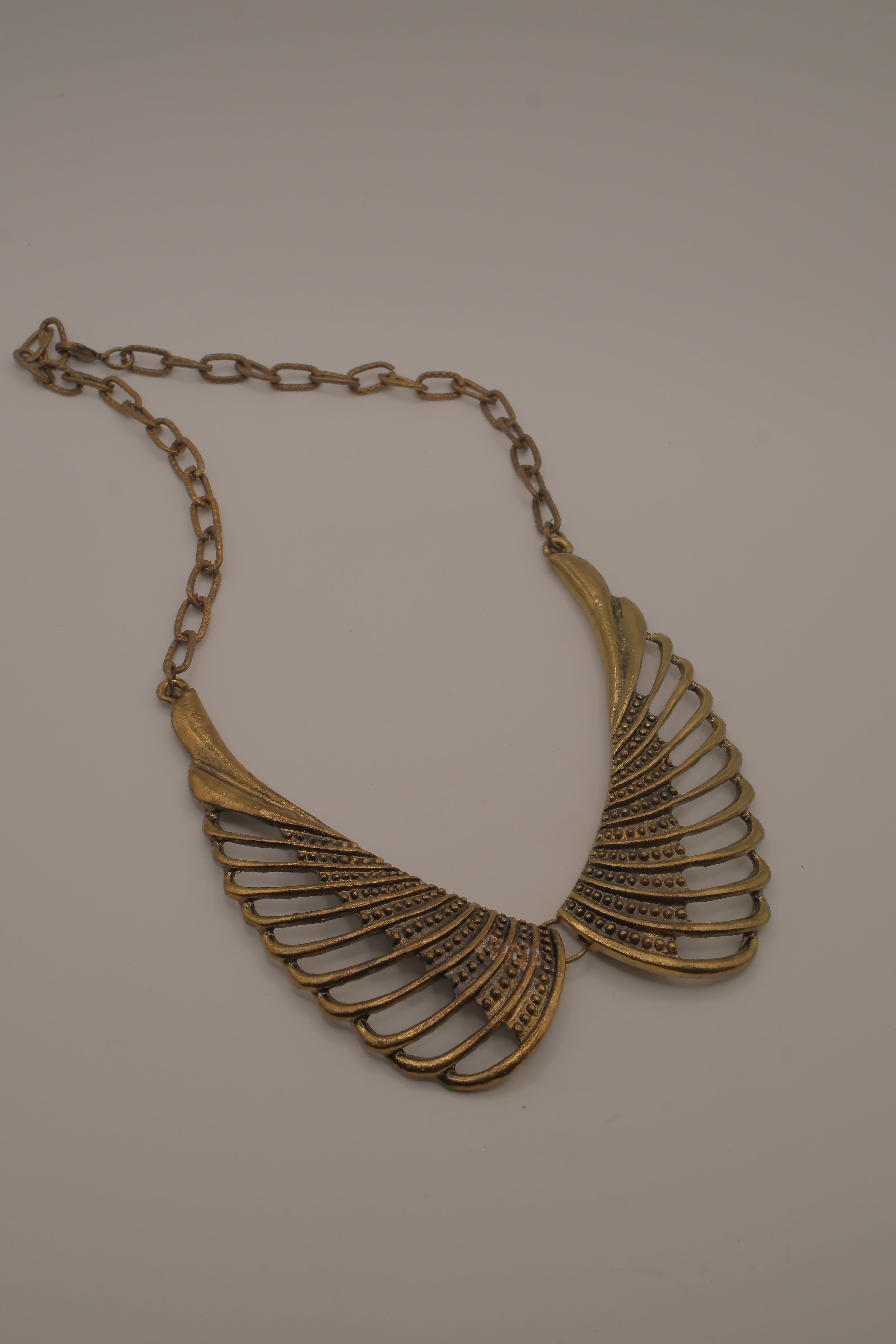 Vintage brass wing-shaped collar bib necklace