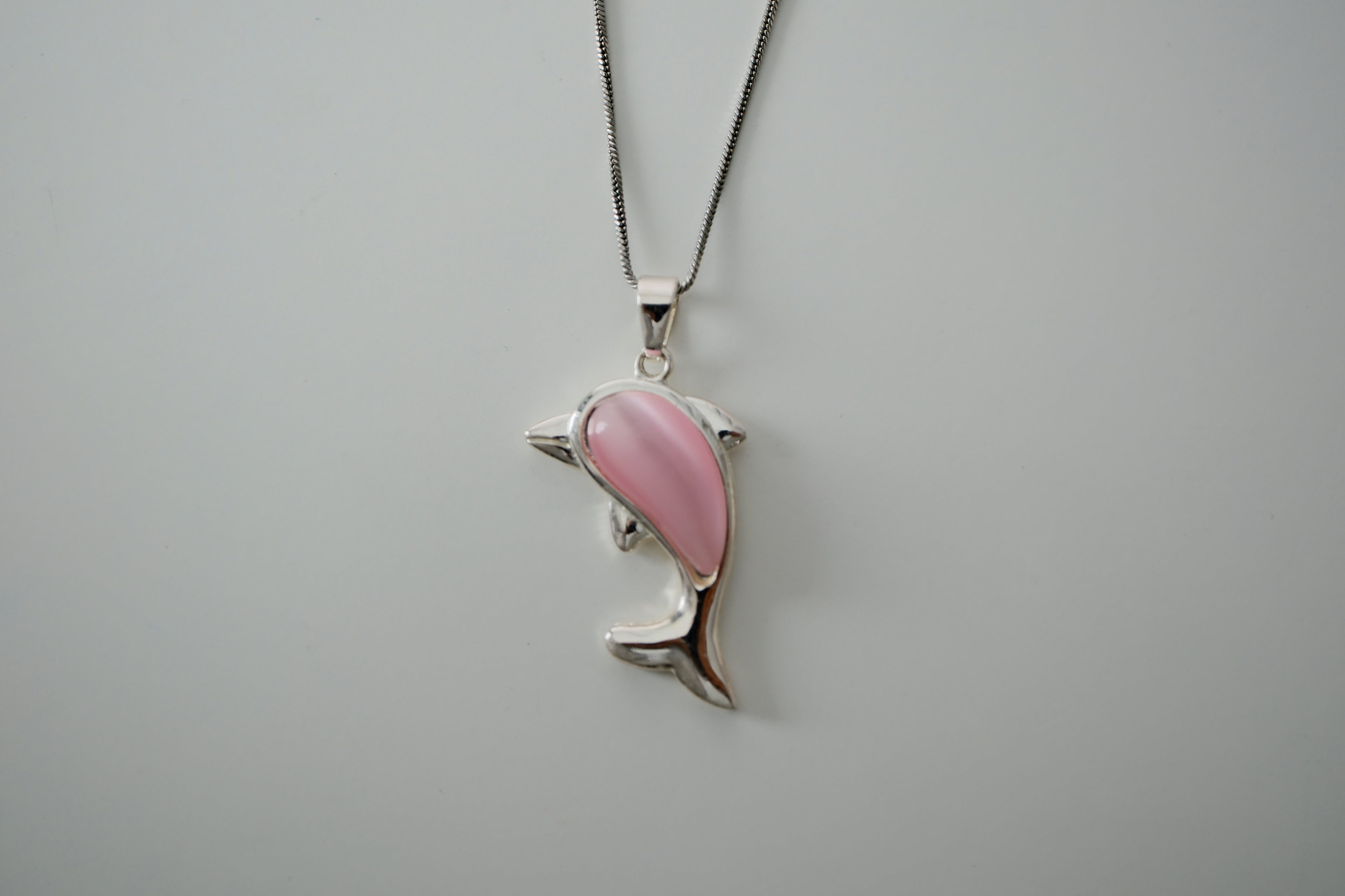 Sterling silver chain and Dolphin pendant with Pink stone