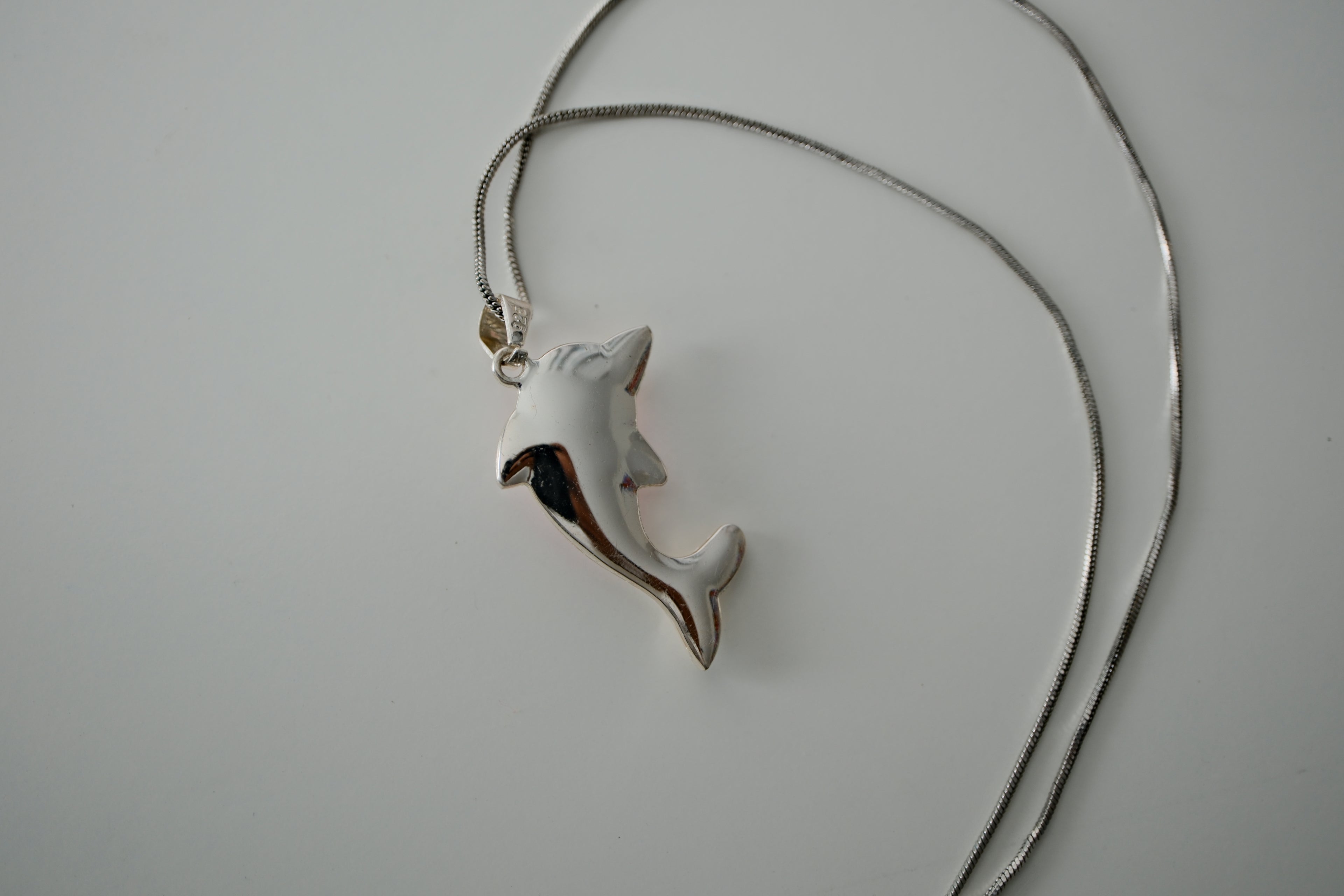 Sterling silver chain and Dolphin pendant with Pink stone