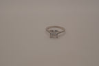 Sterling silver classic solitaire ring with a pavé-set band