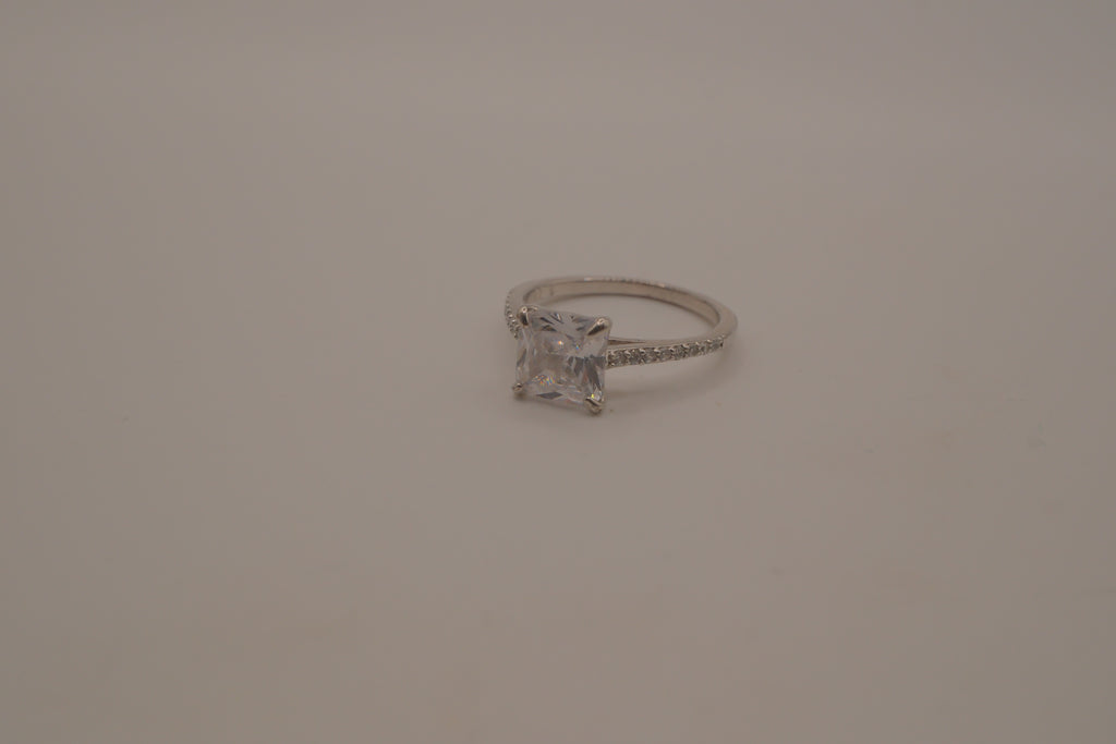 Sterling silver classic solitaire ring with a pavé-set band