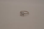 Sterling silver classic solitaire ring with a pavé-set band