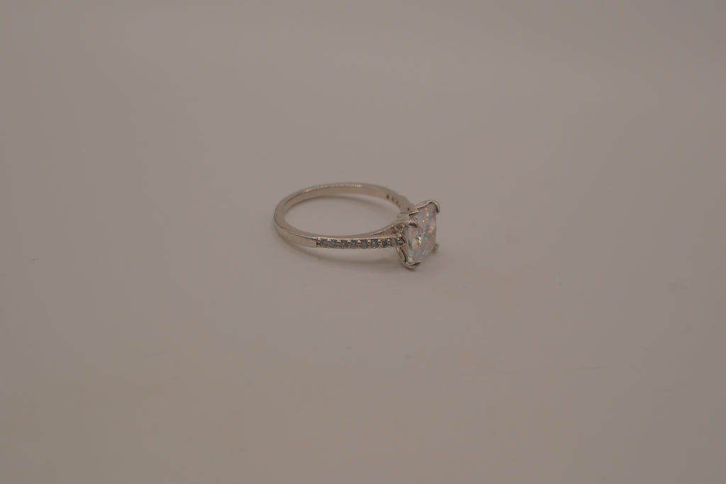 Sterling silver classic solitaire ring with a pavé-set band