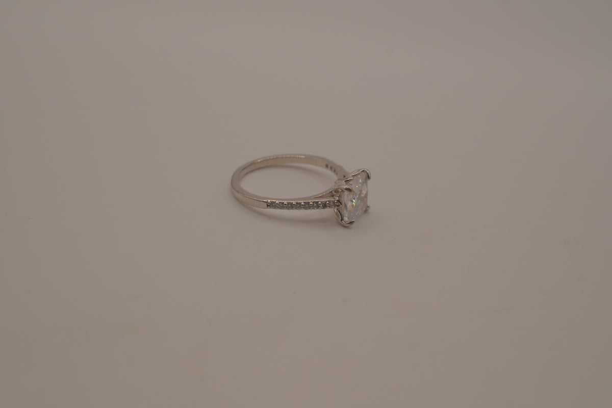 Sterling silver classic solitaire ring with a pavé-set band