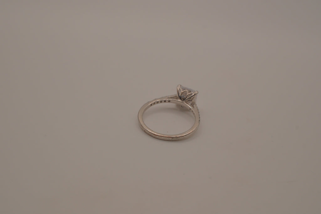 Sterling silver classic solitaire ring with a pavé-set band