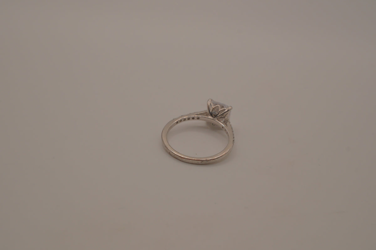 Sterling silver classic solitaire ring with a pavé-set band