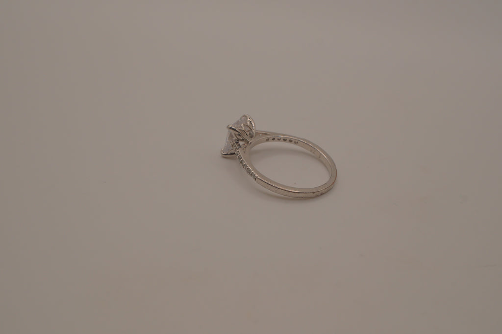 Sterling silver classic solitaire ring with a pavé-set band