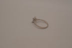 Sterling silver classic solitaire ring with a pavé-set band