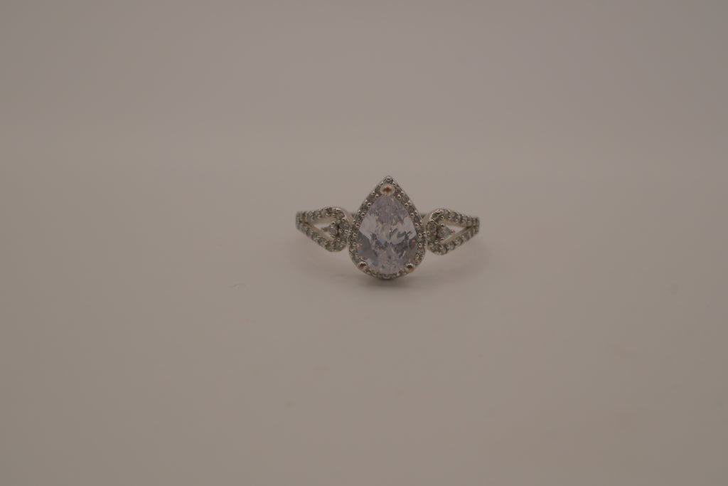 Sterling silver pear-shaped halo ring