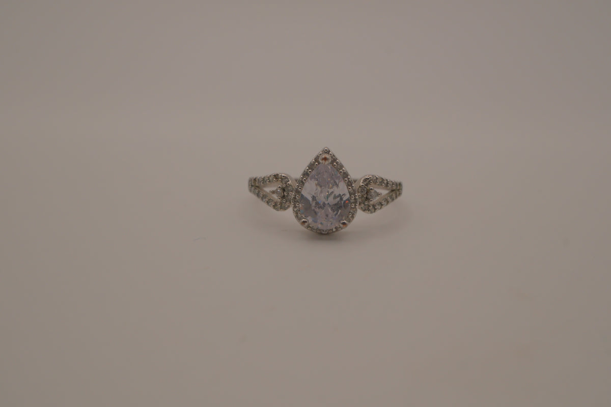 Sterling silver pear-shaped halo ring