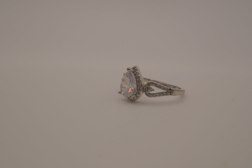 Sterling silver pear-shaped halo ring