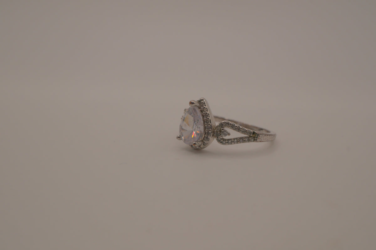 Sterling silver pear-shaped halo ring