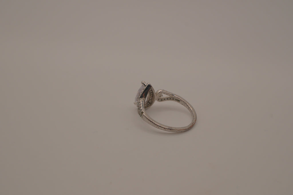Sterling silver pear-shaped halo ring