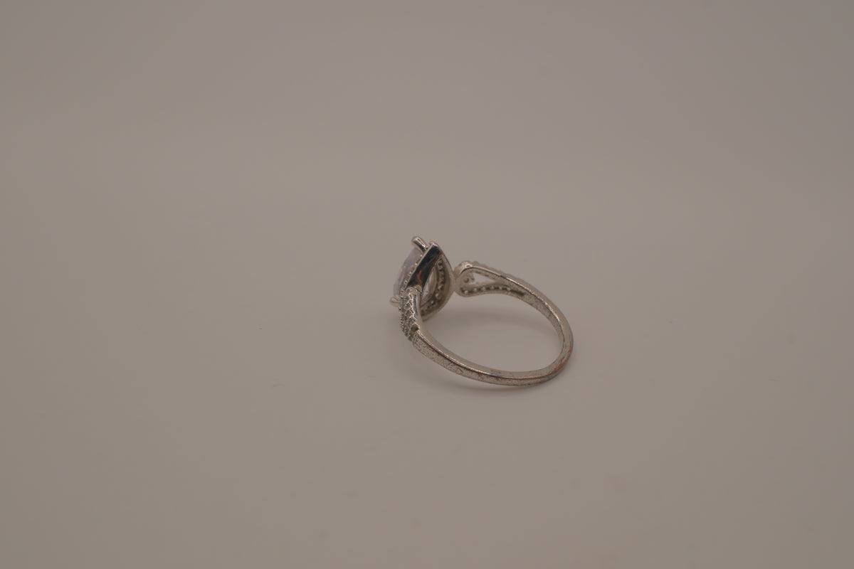 Sterling silver pear-shaped halo ring