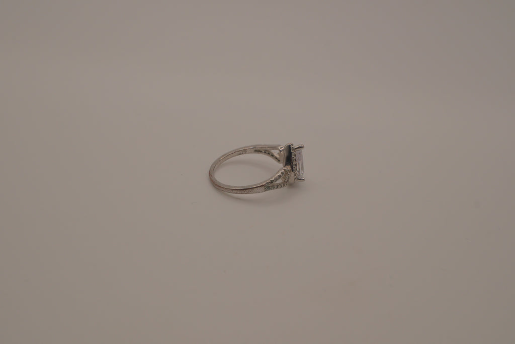 Sterling silver pear-shaped halo ring