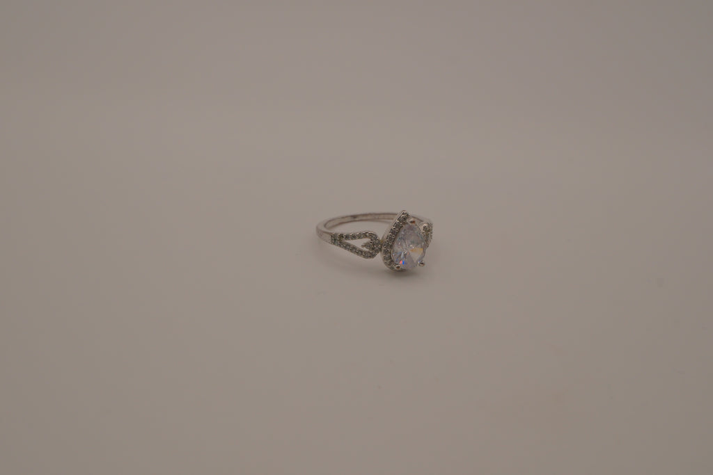 Sterling silver pear-shaped halo ring