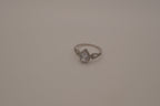 Sterling silver pear-shaped halo ring