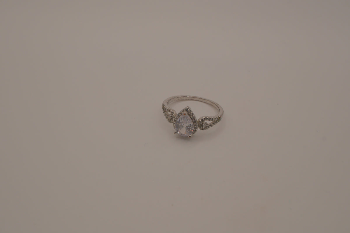 Sterling silver pear-shaped halo ring