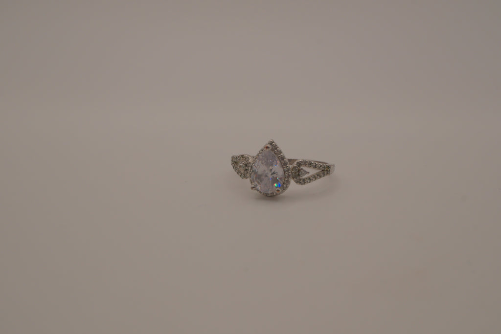 Sterling silver pear-shaped halo ring