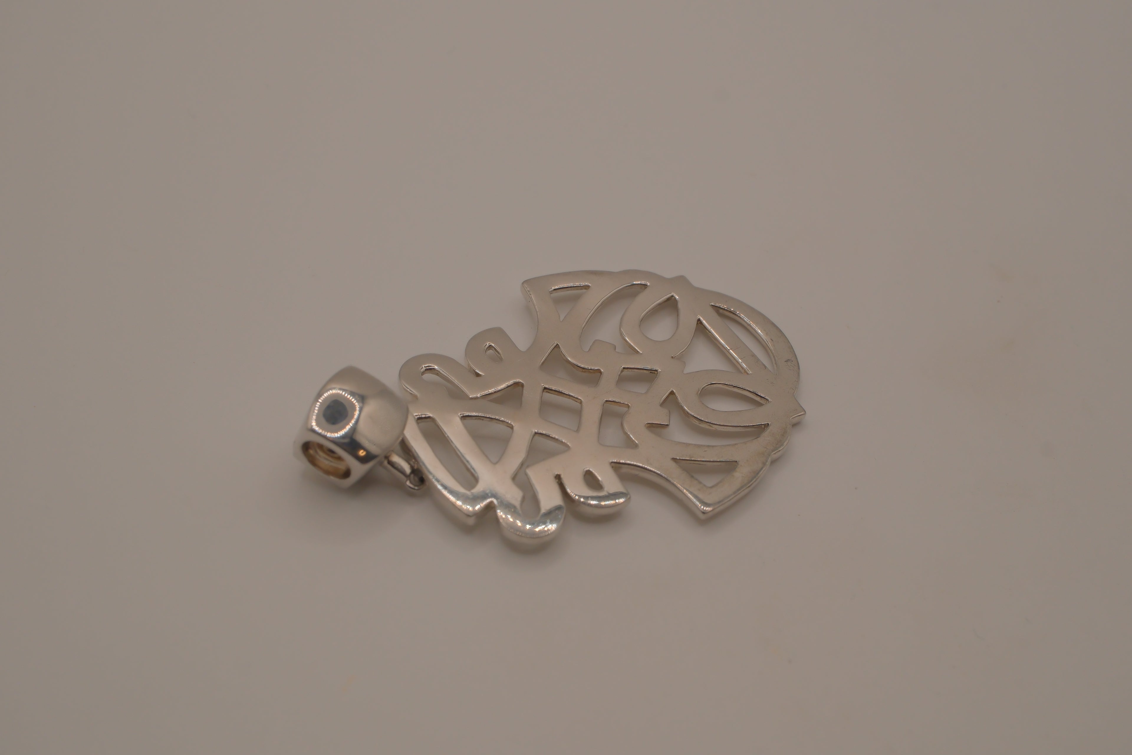 Elle Sterling silver intricate openwork pendant