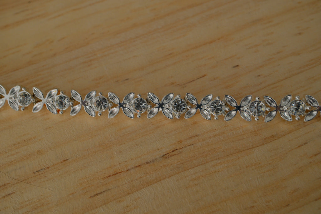 Avon Silver Flower Tennis Bracelet